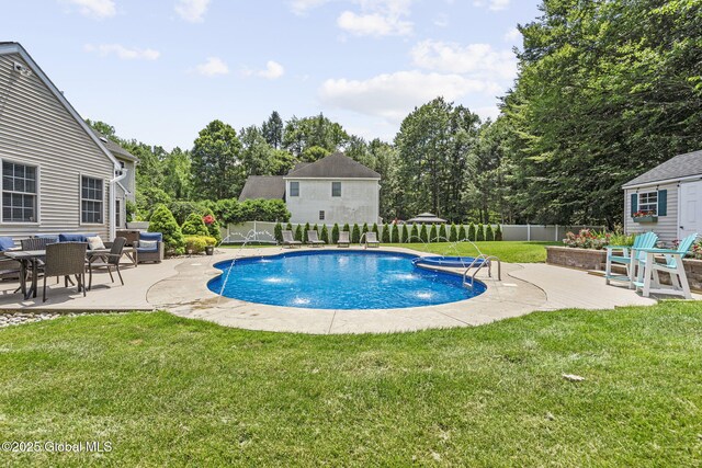 41 Jean Pl, Guilderland, NY 12303 - view of swimming pool with a fenced backyard, a patio area, and view of wooded area