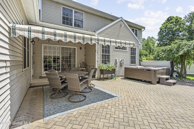 41 Jean Pl, Guilderland, NY 12303 - view of patio / terrace with a hot tub and outdoor dining area