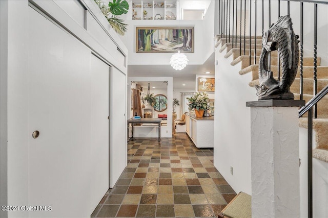 290 Camden Valley Rd, Salem, NY 12873 - foyer with stairway, a high ceiling, and dark stone finish flooring