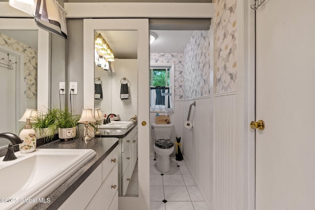 22 Sylvan Ct, Clifton Park, NY 12065 - full bathroom with wallpapered walls, double vanity, wainscoting, and tile patterned flooring