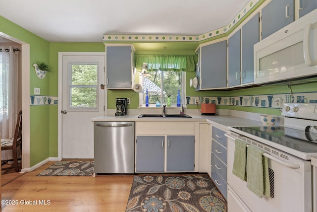 22 Sylvan Ct, Clifton Park, NY 12065 - kitchen with white appliances, light wood-style flooring, light countertops, and gray cabinets