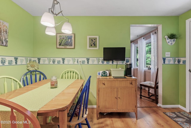 22 Sylvan Ct, Clifton Park, NY 12065 - dining space with light wood-style floors and baseboards