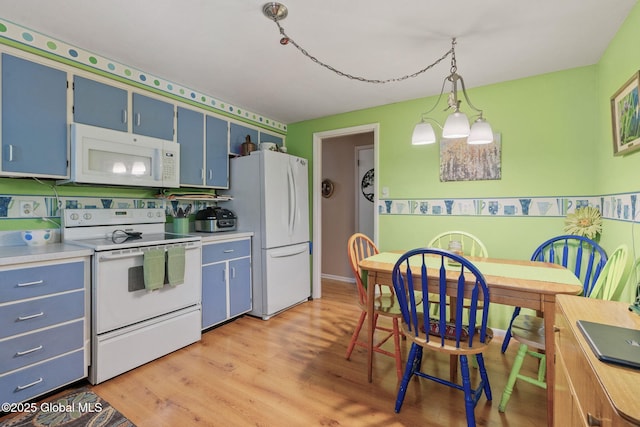 22 Sylvan Ct, Clifton Park, NY 12065 - kitchen with white appliances, blue cabinets, light wood-type flooring, and light countertops