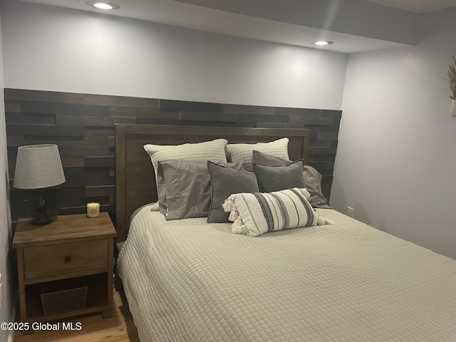 1469 S Shore Rd, Hadley, NY 12835 - bedroom featuring a fireplace, wood finished floors, and recessed lighting
