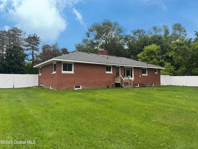 10 Kasper Dr, Colonie, NY 12211 - rear view of property with brick siding and a chimney