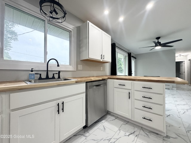 10 Kasper Dr, Colonie, NY 12211 - kitchen featuring wooden counters, dishwasher, light marble finish flooring, a sink, and recessed lighting