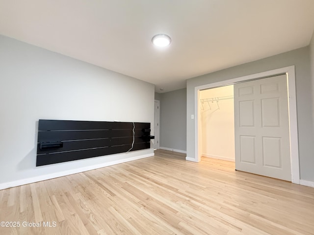 10 Kasper Dr, Colonie, NY 12211 - unfurnished living room with wood finished floors and baseboards