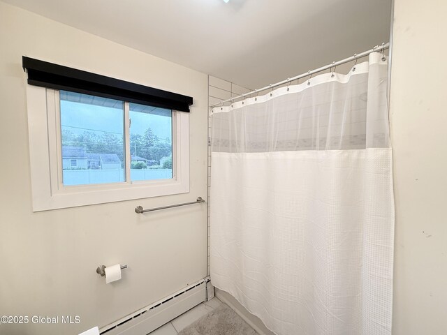 10 Kasper Dr, Colonie, NY 12211 - bathroom featuring baseboard heating and curtained shower