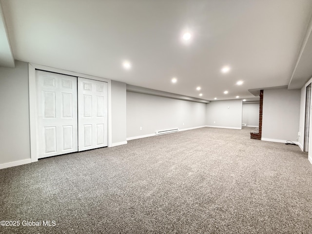 10 Kasper Dr, Colonie, NY 12211 - finished below grade area with a baseboard heating unit, baseboards, carpet flooring, and recessed lighting