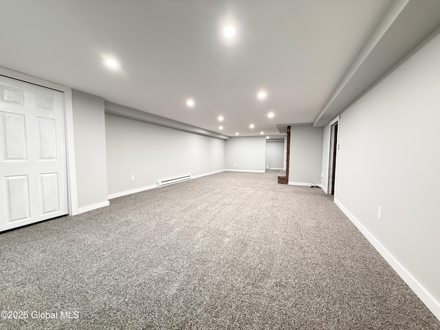 10 Kasper Dr, Colonie, NY 12211 - finished basement featuring a baseboard radiator, carpet flooring, recessed lighting, and baseboards