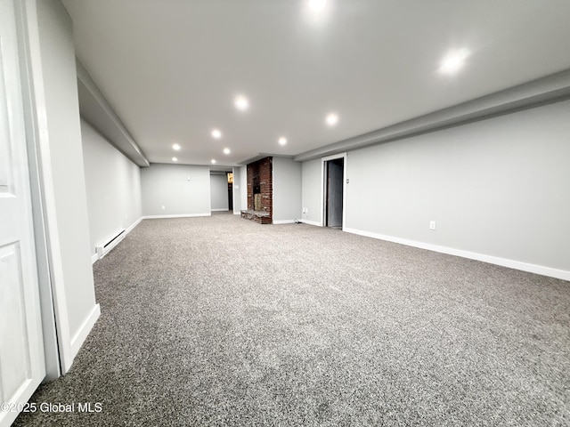 10 Kasper Dr, Colonie, NY 12211 - finished basement with a baseboard heating unit, baseboards, carpet, and recessed lighting