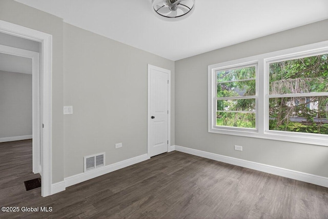 12 Haviland Ave, Glens Falls, NY 12801 - unfurnished room featuring baseboards and dark wood finished floors
