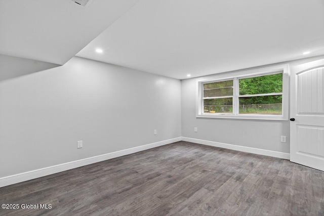 12 Haviland Ave, Glens Falls, NY 12801 - unfurnished bedroom with wood finished floors, recessed lighting, and baseboards