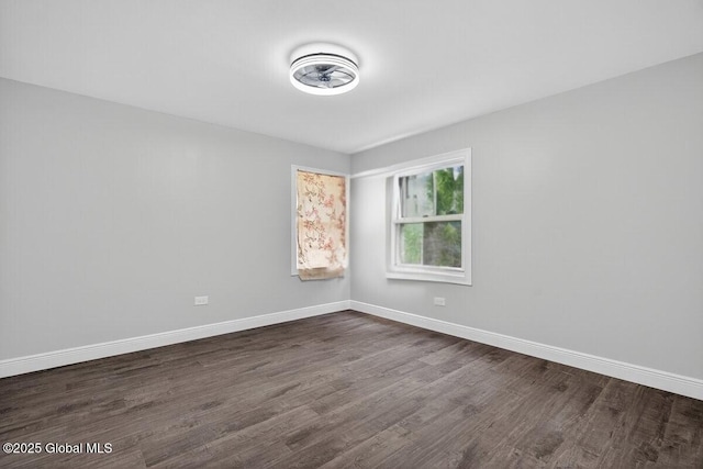 12 Haviland Ave, Glens Falls, NY 12801 - spare room with dark wood-style floors and baseboards