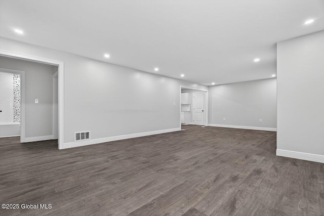 12 Haviland Ave, Glens Falls, NY 12801 - basement with recessed lighting, dark wood-style flooring, and baseboards