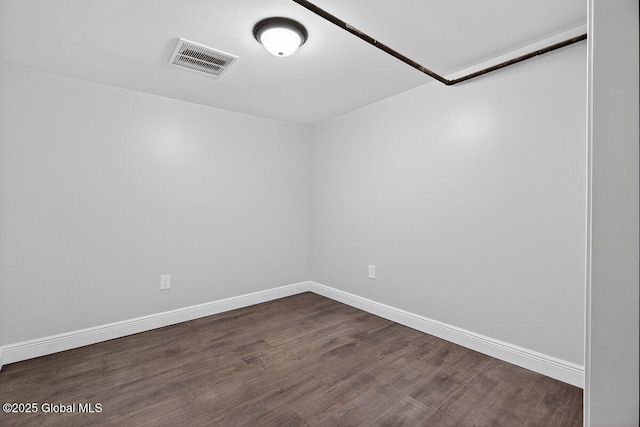 12 Haviland Ave, Glens Falls, NY 12801 - unfurnished room with baseboards and dark wood finished floors