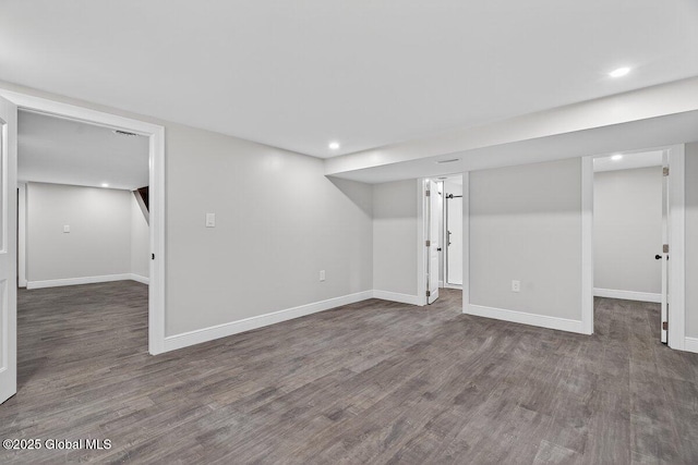 12 Haviland Ave, Glens Falls, NY 12801 - finished basement featuring dark wood finished floors, baseboards, and recessed lighting