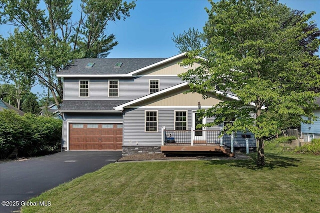 6 Maple Ter, Bethlehem, NY 12054 - rear view of property with driveway, a wooden deck, a garage, a lawn, and roof with shingles