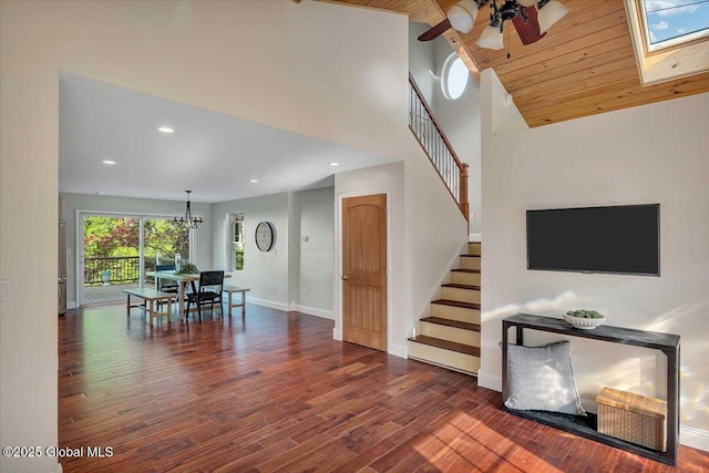6 Maple Ter, Bethlehem, NY 12054 - dining area featuring stairway, lofted ceiling, wood finished floors, recessed lighting, and a chandelier
