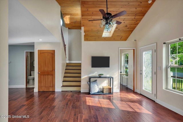 6 Maple Ter, Bethlehem, NY 12054 - unfurnished living room with stairway, ceiling fan, dark wood-style floors, wood ceiling, and high vaulted ceiling