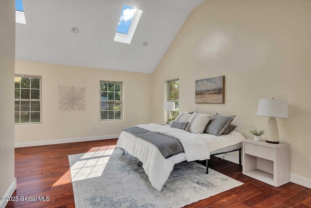 6 Maple Ter, Bethlehem, NY 12054 - bedroom with a skylight, wood finished floors, multiple windows, and high vaulted ceiling