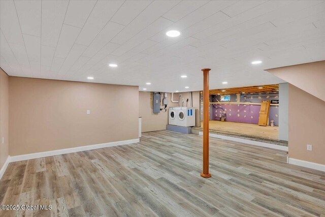 6 Maple Ter, Bethlehem, NY 12054 - finished below grade area with washer and clothes dryer, wood finished floors, recessed lighting, and electric panel
