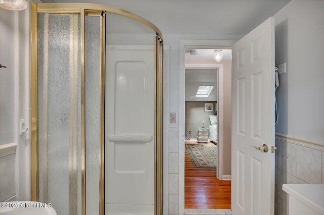 3083 E Old State Rd, Guilderland, NY 12303 - full bathroom with a shower stall and wood finished floors