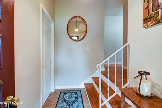 4 Tomohawk Pl, Johnstown, NY 12095 - stairway with tile patterned flooring and baseboards
