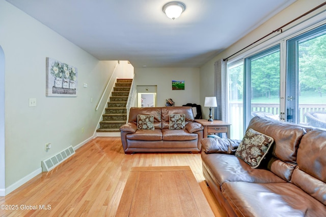 4 Tomohawk Pl, Johnstown, NY 12095 - living area with stairs and light wood finished floors