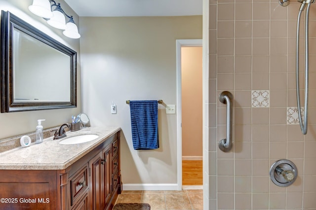 4 Tomohawk Pl, Johnstown, NY 12095 - bathroom featuring vanity, tile patterned flooring, and tiled shower