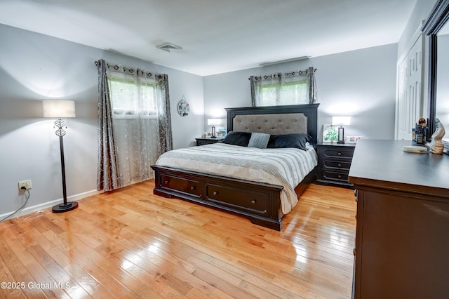 4 Tomohawk Pl, Johnstown, NY 12095 - bedroom with multiple windows and light wood-type flooring