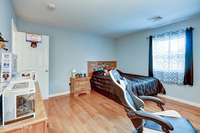 4 Tomohawk Pl, Johnstown, NY 12095 - bedroom with wood finished floors and a desk