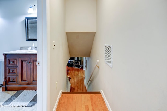 4 Tomohawk Pl, Johnstown, NY 12095 - hall with an upstairs landing and wood finished floors