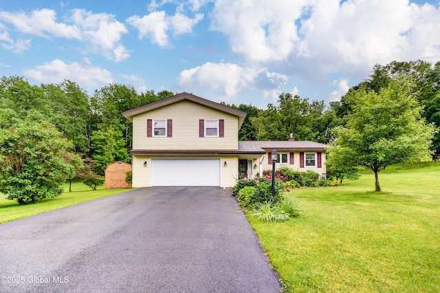 4 Tomohawk Pl, Johnstown, NY 12095 - tri-level home featuring an attached garage, driveway, a front lawn, and a chimney
