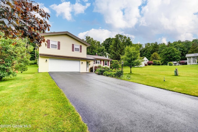 4 Tomohawk Pl, Johnstown, NY 12095 - split level home featuring a garage, driveway, and a front yard