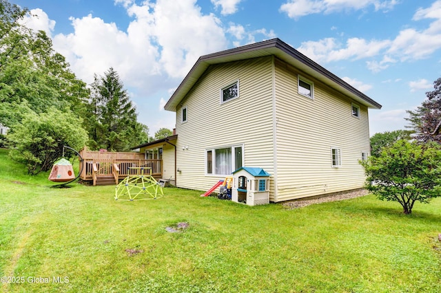 4 Tomohawk Pl, Johnstown, NY 12095 - rear view of property featuring a wooden deck and a yard