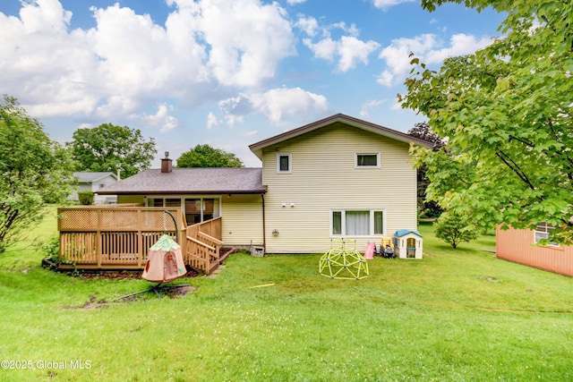 4 Tomohawk Pl, Johnstown, NY 12095 - rear view of house with a wooden deck, a yard, and a chimney