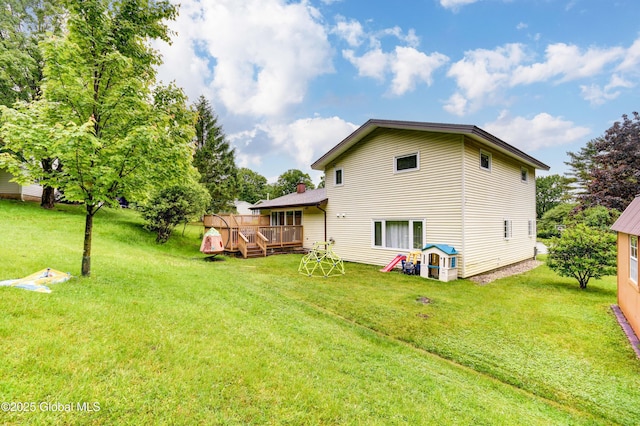 4 Tomohawk Pl, Johnstown, NY 12095 - back of property featuring a deck and a yard