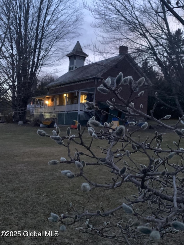 3 Meacham St, Port Henry, NY 12974 - rear view of house featuring a chimney