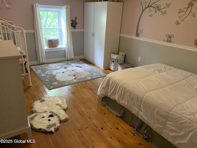 3 Meacham St, Port Henry, NY 12974 - bedroom with hardwood / wood-style flooring and baseboards
