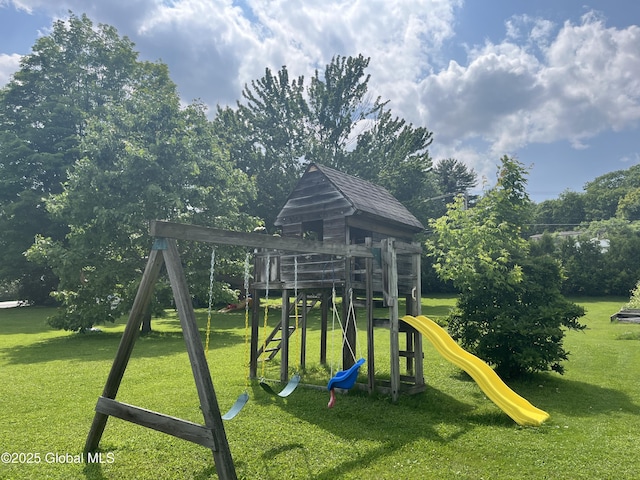 3 Meacham St, Port Henry, NY 12974 - view of play area featuring a lawn and view of scattered trees