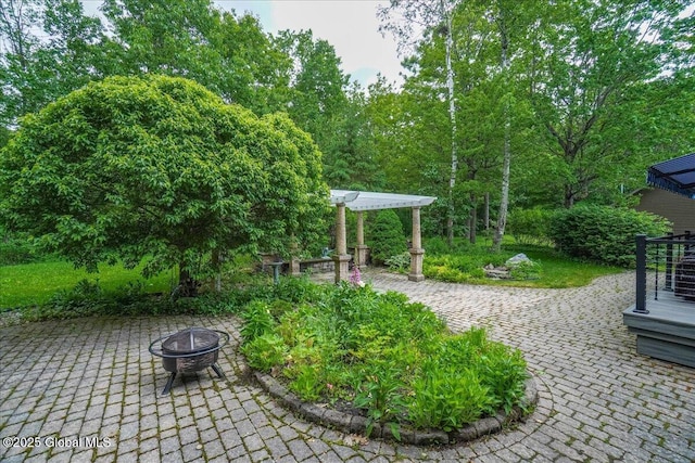 2034 Duanesburg Churches Rd, Duanesburg, NY 12053 - view of patio featuring a fire pit