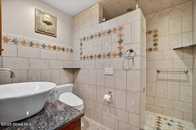 2034 Duanesburg Churches Rd, Duanesburg, NY 12053 - bathroom featuring tile walls, vanity, and tiled shower