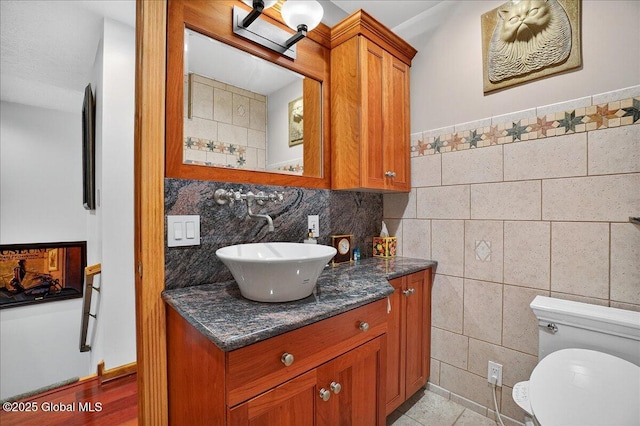 2034 Duanesburg Churches Rd, Duanesburg, NY 12053 - bathroom featuring vanity and tile walls