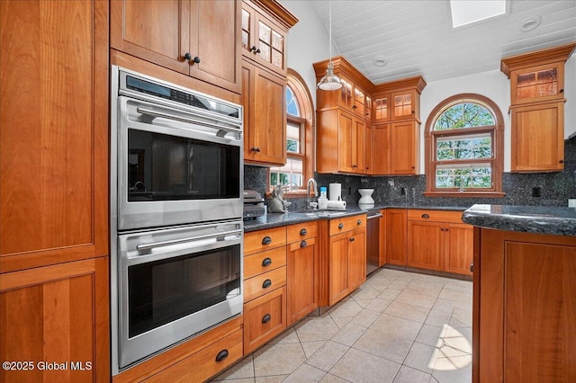 2034 Duanesburg Churches Rd, Duanesburg, NY 12053 - kitchen with appliances with stainless steel finishes, plenty of natural light, and backsplash