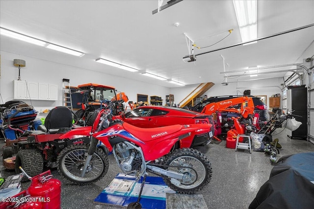 2034 Duanesburg Churches Rd, Duanesburg, NY 12053 - garage featuring a garage door opener