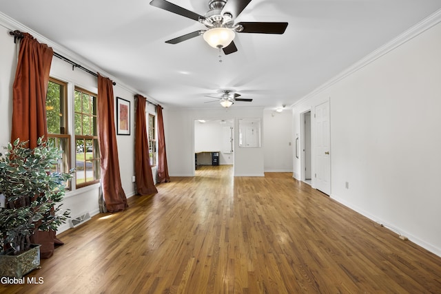 67 Victoria Way, Albany, NY 12209 - unfurnished living room featuring ceiling fan, ornamental molding, and wood finished floors