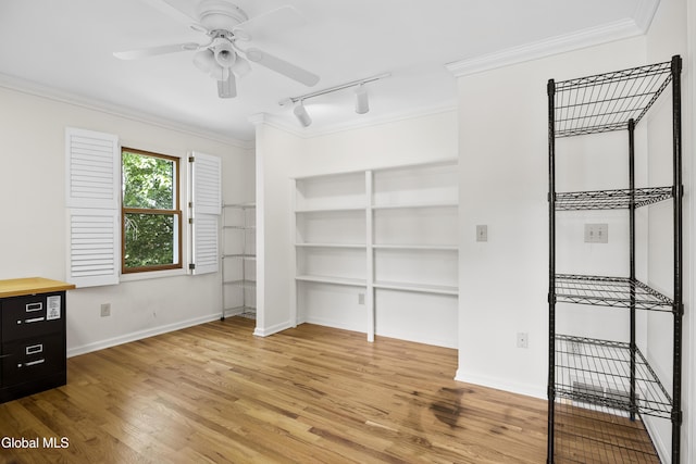 67 Victoria Way, Albany, NY 12209 - unfurnished bedroom with rail lighting, crown molding, light wood-style flooring, and a ceiling fan