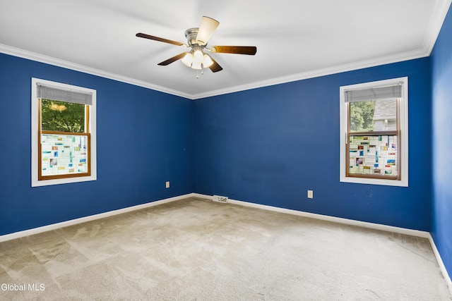 67 Victoria Way, Albany, NY 12209 - carpeted empty room featuring healthy amount of natural light, crown molding, and ceiling fan