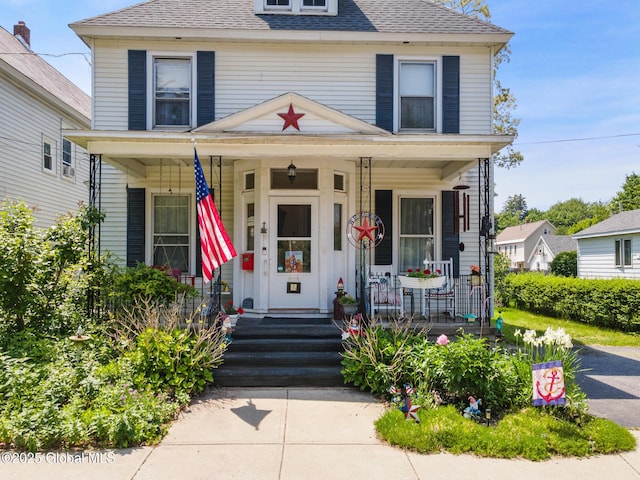 7 Bruce St, Scotia, NY 12302 - american foursquare style home with a shingled roof and a porch